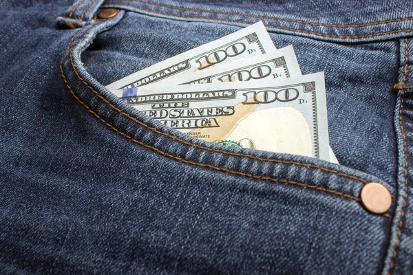 Dollar banknotes in jeans pocket closeup. Business concept. pocket money. — Stock Photo, Image