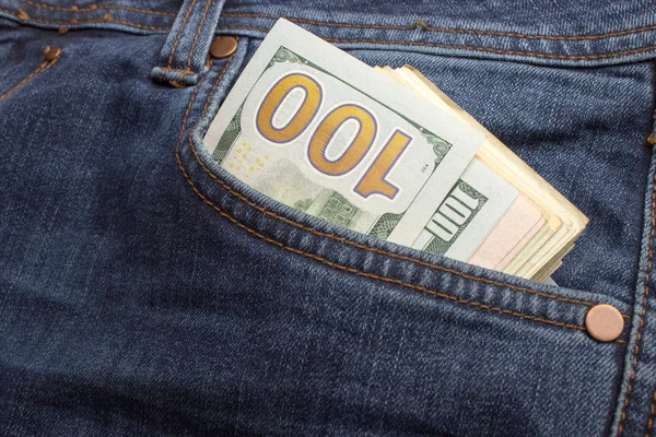 American dollar bills in jeans pocket background — Stock Photo, Image