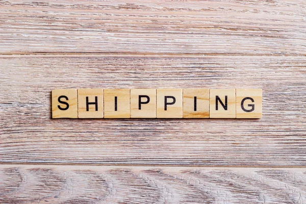 Blok kavramı bir ahşap zemin üzerine nakliye kelime