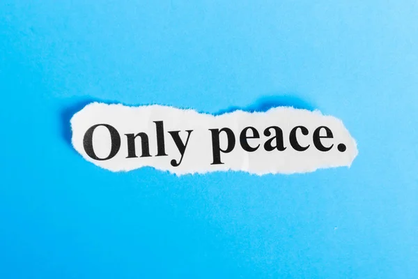 Only peace text on paper. Word Only peace on a piece of paper. Concept Image.