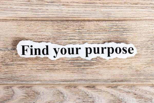find your purpose text on paper. Word find your purpose on torn paper. Concept Image