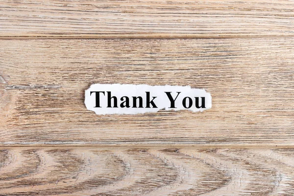 Thank you text on paper. Word thank you on torn paper. Concept Image — Stock Photo, Image