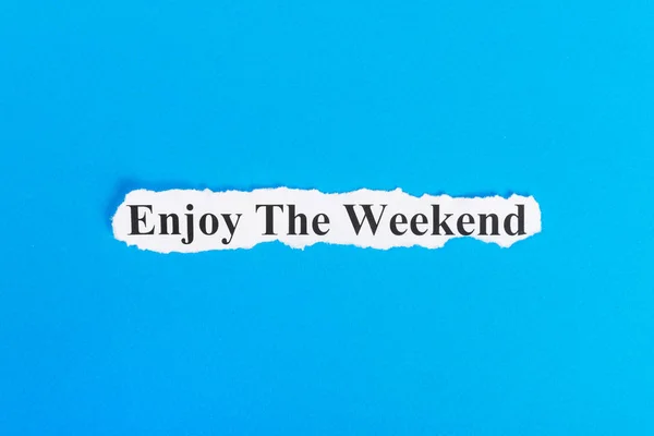 Enjoy the weekend text on paper. Word enjoy the weekend on torn paper. Concept Image — Stock Photo, Image