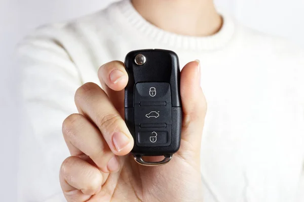 Car Keys. Seller hand giving keys. girl with car keys