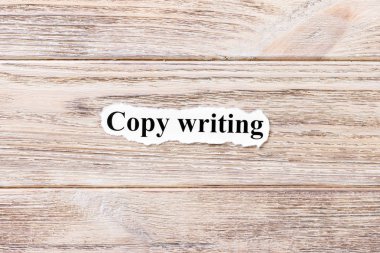 Kopya yazma kağıt üzerinde kelime. kavram. Ahşap arka plan üzerinde kopya yazma kelimeler