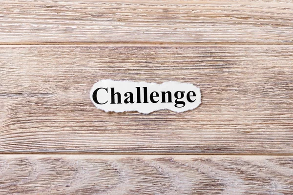 Challenge of the word on paper. concept. Words of Challenge on a wooden background — Stock Photo, Image