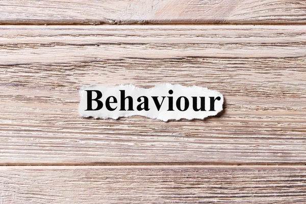 Behaviour of the word on paper. concept. Words of behaviour on a wooden background — Stock Photo, Image