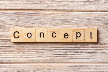 Tahta blokta yazan kavramsal kelime. Tablo, konsept üzerinde kavram metni