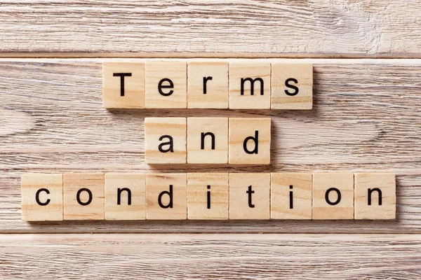 Terms and condition word written on wood block. Terms and condition text on table, concept