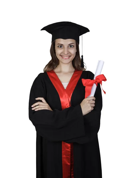 Estudiante en vestido de graduación sosteniendo libros y un diploma aislado sobre fondo blanco —  Fotos de Stock