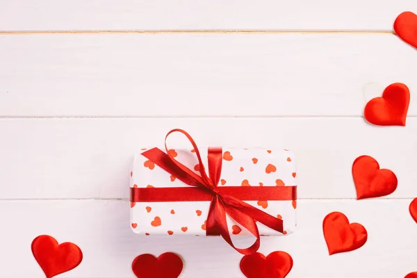 Valentine or other holiday handmade present in paper with red he — 스톡 사진