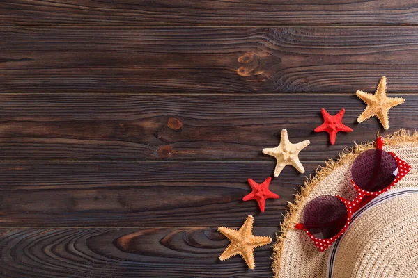 Summer holiday beach background with accessories on wooden table Stock Picture