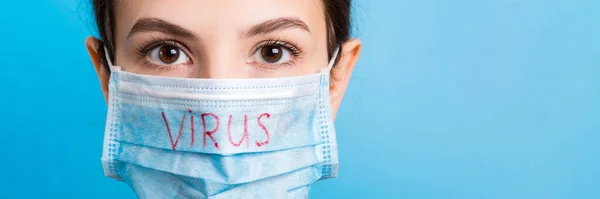 Portrait Pretty Woman Wearing Medical Mask Virus Text Blue Background — Stock Photo, Image