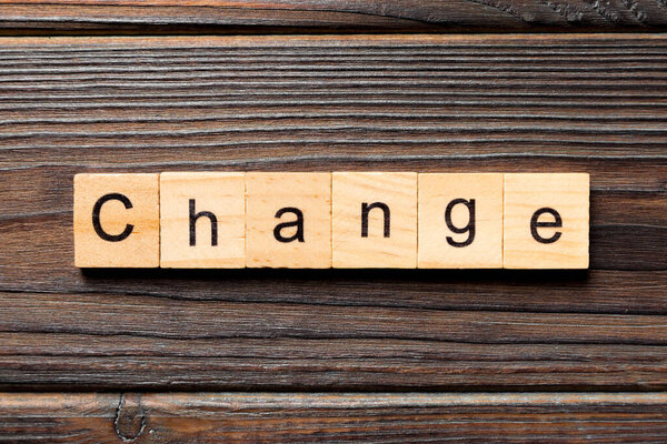 CHANGE word written on wood block. CHANGE text on wooden table for your desing, concept.