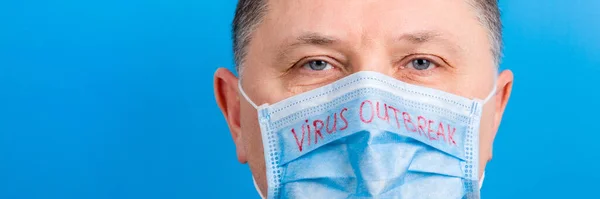 Portrait Man Wearing Medical Mask Virus Outbreak Word Blue Background — 스톡 사진