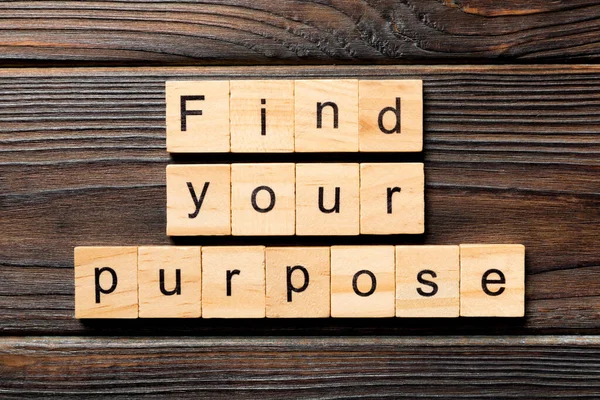 find your purpose word written on wood block. find your purpose text on table, concept.