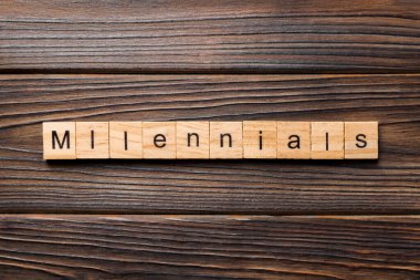 millennials kelime ahşap blok üzerinde yazılı. Millennials metin tablo, kavram.