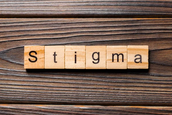 Stigma Wort Auf Holzblock Geschrieben Stigma Text Auf Dem Tisch — Stockfoto