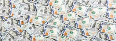 Arka plan olarak yapılmış 100 dolarlık banknotların en üst görüntüsü. Amerikan doları konsepti. Amerikan dolarlarının dokusu.