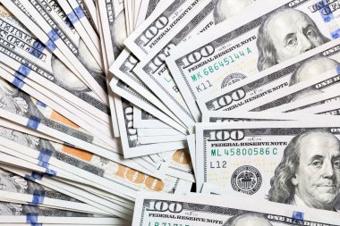 Amerikan Doları banknotları. yüz dolarlık banknotlar arka plan. Kopyalama alanı ile arka planda iş kavramının en iyi görünümü.