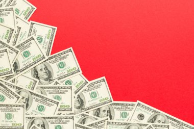 Renkli arka plan üst görünümünde yüz dolarlık banknotlar, metin iş para kavramı için boş bir yer ile. Yüz dolarlık arka plan..