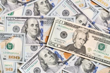 Amerikan Doları banknotları. yüz dolarlık banknotlar arka plan. Kopyalama alanı ile arka planda iş kavramının en iyi görünümü.