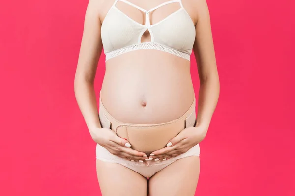 Zbliżenie Kobiety Ciąży Bieliźnie Ubranej Gorset Ortopedyczny Dla Zmniejszenia Bólu — Zdjęcie stockowe
