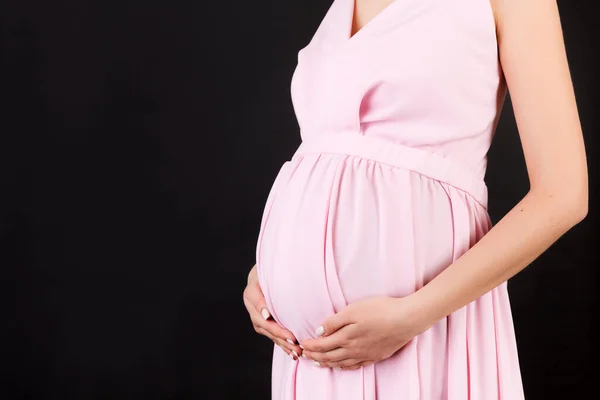 Cropped Image Pregnant Woman Hugging Her Abdomen Mother Wearing Pink — Stock Photo, Image
