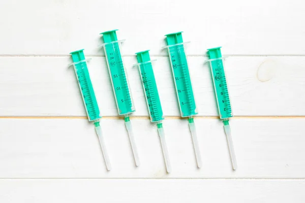 Top View Syringes Different Sizes Wooden Background Medical Equipment Injection — Stock Photo, Image