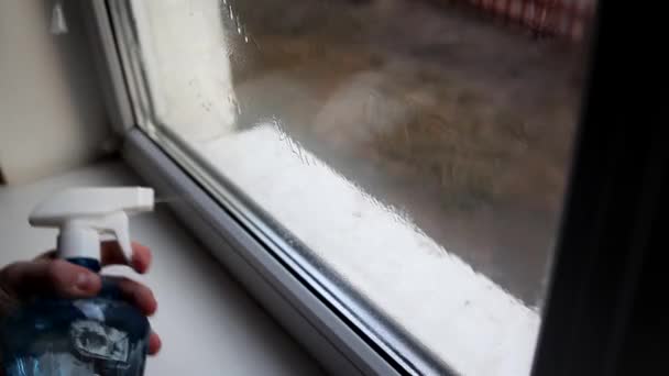 Men Washes Windows Home Cleaning Window Wash Spray Duster Concept — Stock Video