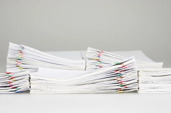 Pile overload document have blur pile paperwork as background — Stock fotografie