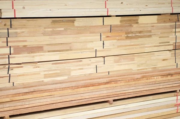 Stack of wood construction materials for building industry — Stock Photo, Image