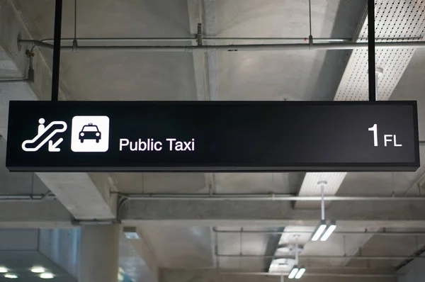Public taxi information board sign at international airport