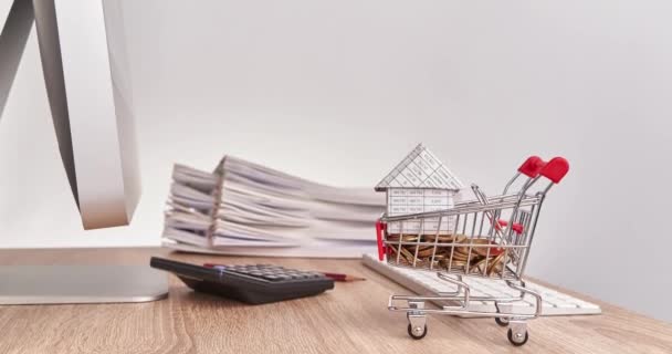 House in shopping cart with pile overload document time lapse — Stock Video