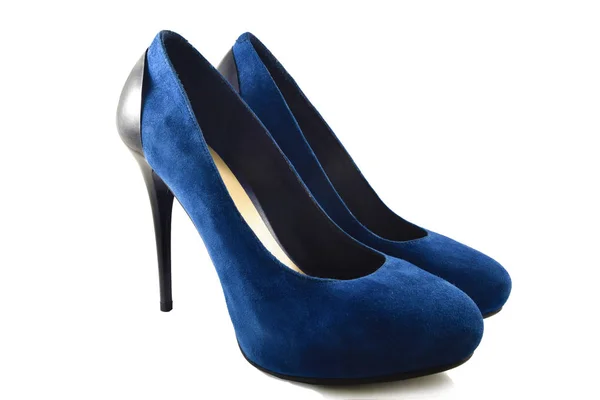 Blue suede shoes on a white background Stock Picture