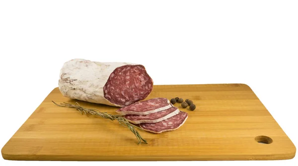 Salami on a wooden board — Stock Photo, Image