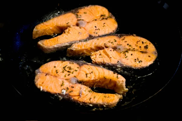 Two salmon steaks with rosemary — Stock Photo, Image