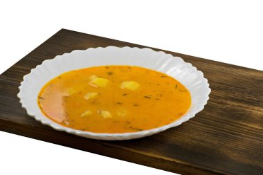 Lezzetli peynir krem çorbası bir ahşap tahta üzerinde. Balkabağı çorbası.