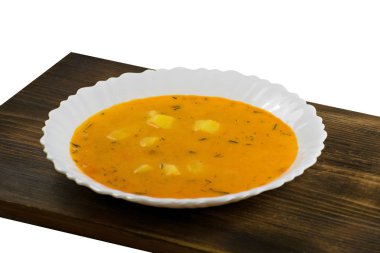 Lezzetli peynir krem çorbası bir ahşap tahta üzerinde. Balkabağı çorbası.