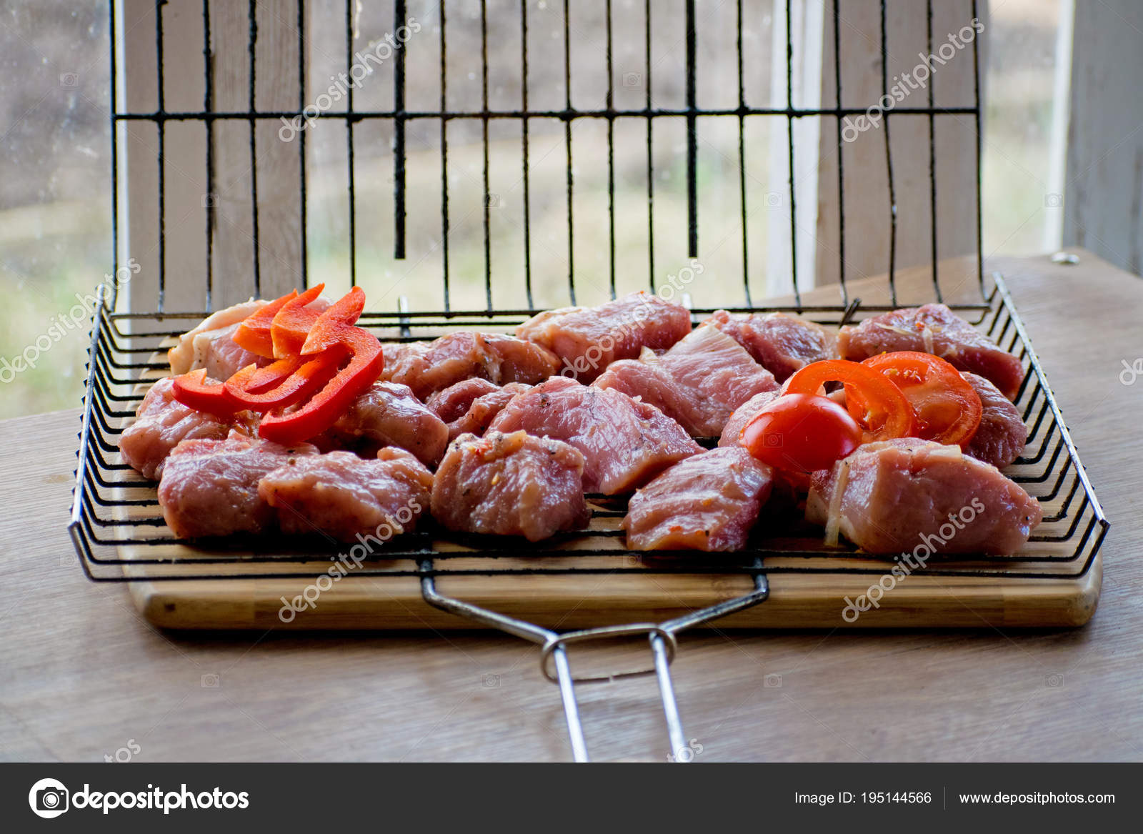 Marinated raw pork kebabs for summer barbecue party with vegetables