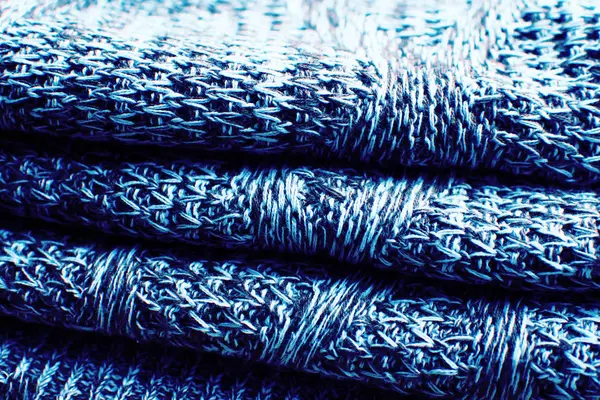 Knitted blue sweater texture. Classic blue texture with cable pattern. — Stockfoto