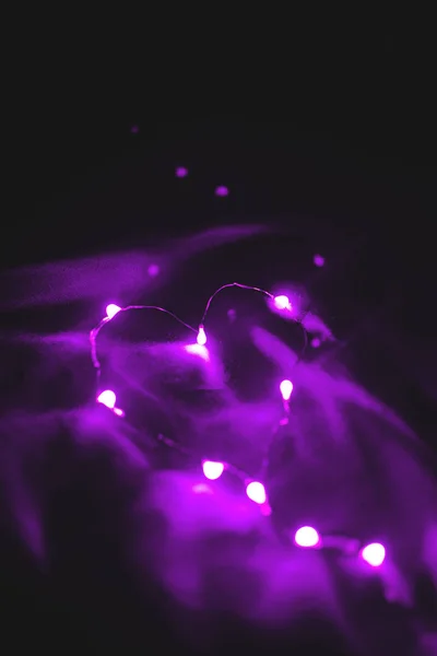 Beautiful neon heart on purple background. Valentines Day Greeting Card. — Stock Photo, Image