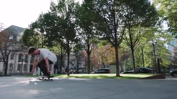 Skateboarder Doing Flip Trick Super Slow Motion Downtown City Reflecting 스톡 비디오