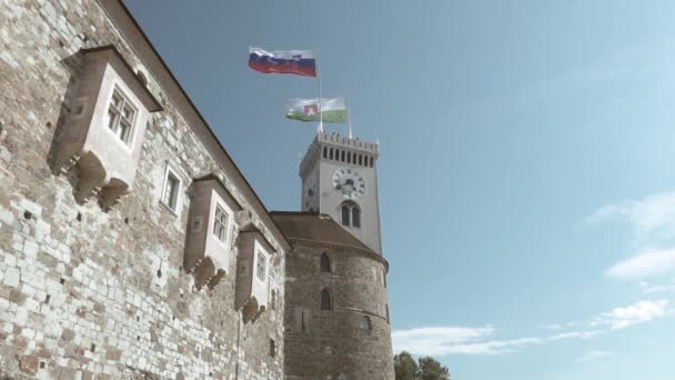 Slovenian Landmark Ljubljana Castle Hoist Flags Blowing Wind Shot High — Stock Video