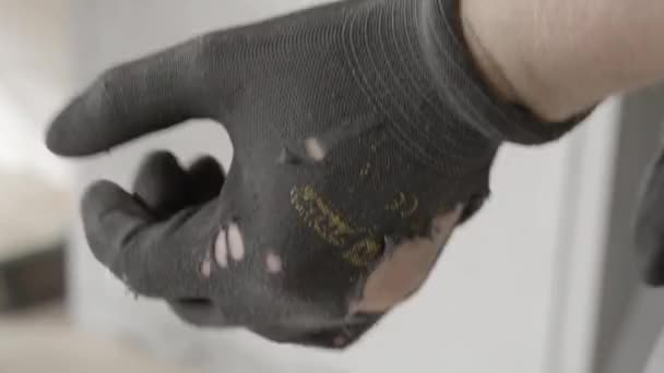 Person Put Dirty Gloves Industrial Workshop — Stock Video