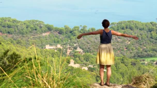 Young Happy Woman Reaches Top Mountain Cliff Raises Her Arms — Stock Video