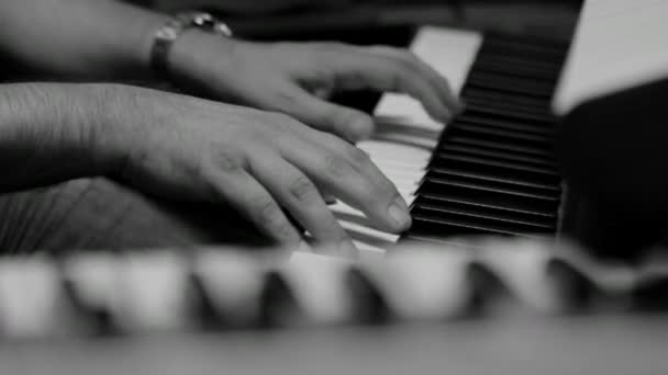 Playing the piano BW — Stock Video
