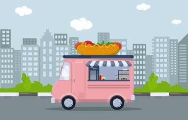 Hot Dog 'lu pembe yemek kamyonu. Şehirdeki mobil kafe.