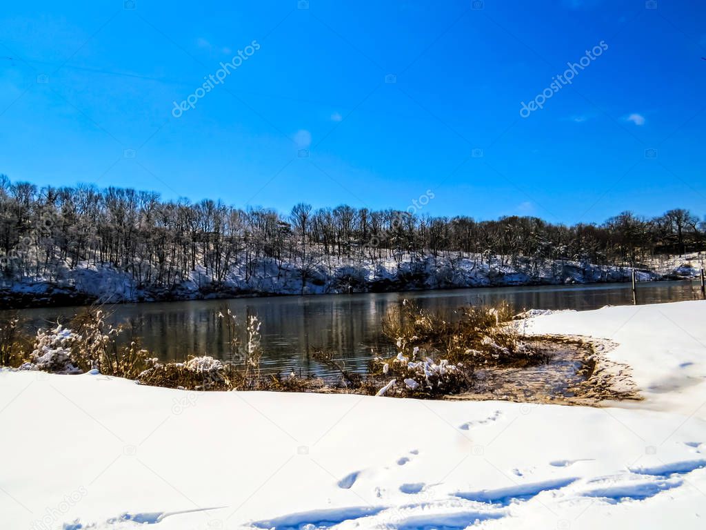 Snow On A New Jersey Riverbank