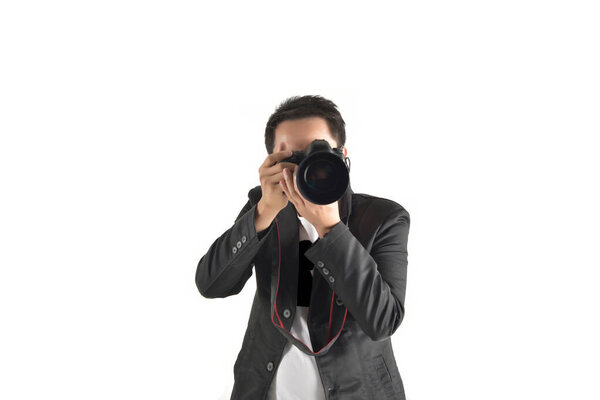 new generation of young Asian photographers are filming advertisements for the company. In a separate studio on a white background, the online photo business concept is popular today.